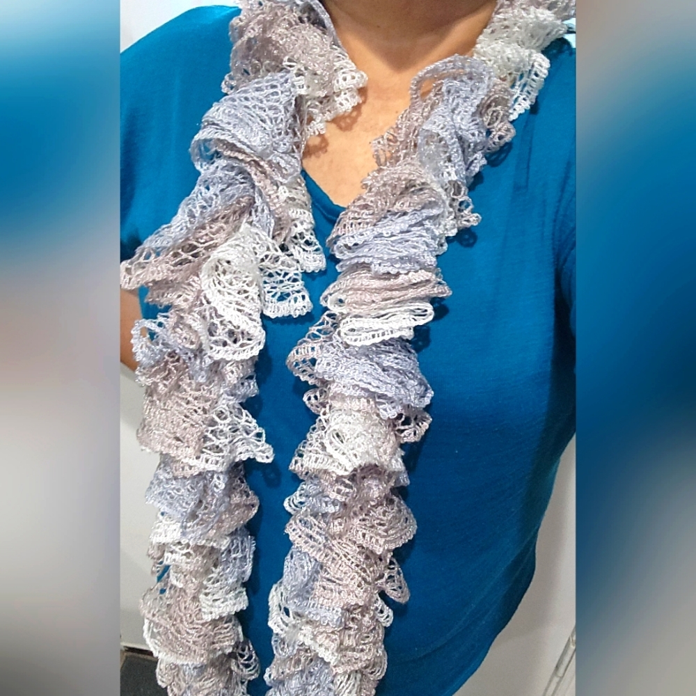 Handmade loose knit metallic light colored ruffled scarf